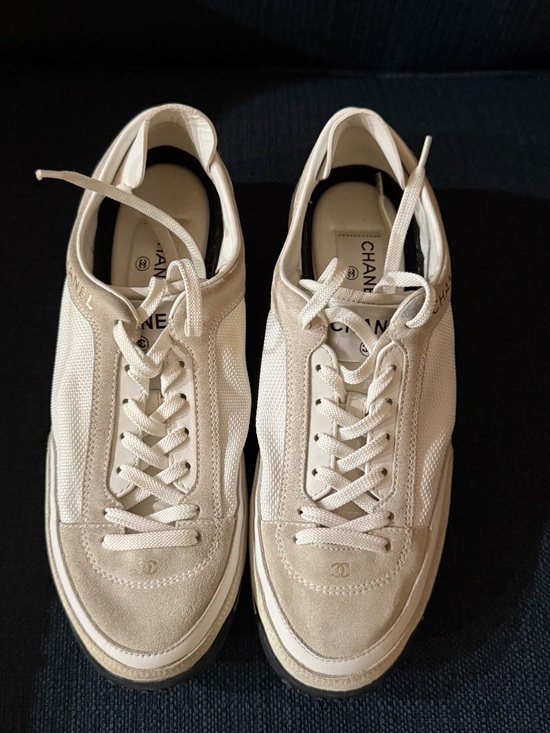 CHANEL Shoes - CHANEL Cream Lace-Up 
Sneakers
